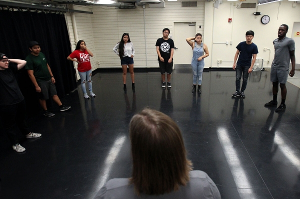 Improvisational Mind Students receiving instructions for performing at their impromptu final!